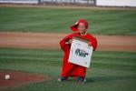 A young fan delivering the game ball...